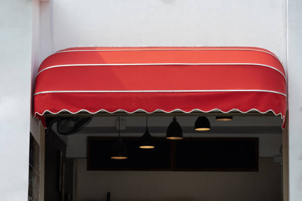 Jasa Kanopi Kain red curve awning of shop. red canvas roof.