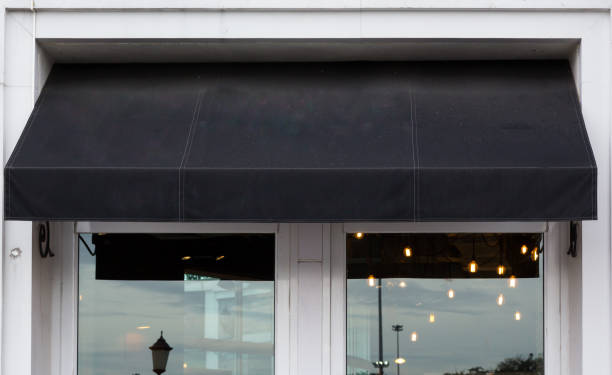 Jasa Kanopi Kain black awning over cafe windows