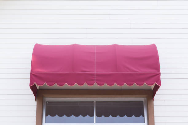 Jasa Kanopi Kain red awning over window